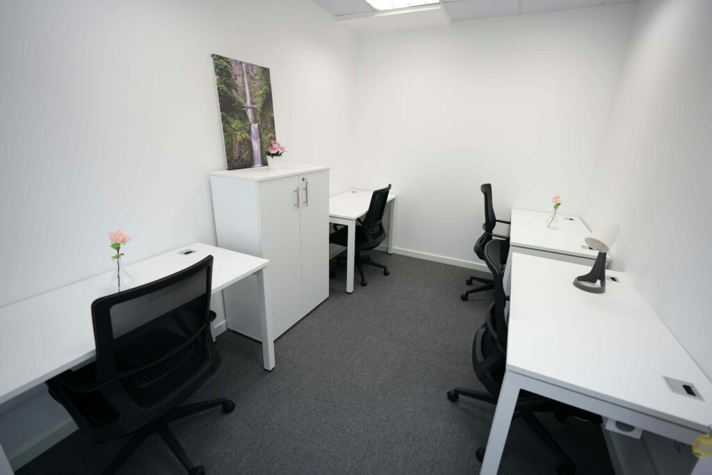 pexels-photo-20101352-20101352 A minimalist office with sleek white furniture and neutral decor, ideal for productivity.